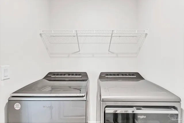 a work room with furniture and windows