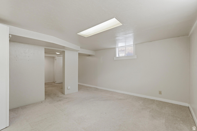378 West 200 South Bountiful, UT 84010 - Photo 20 of 32 Spacious room featuring light-toned carpeting, a horizontal window, and recessed rectangular lighting