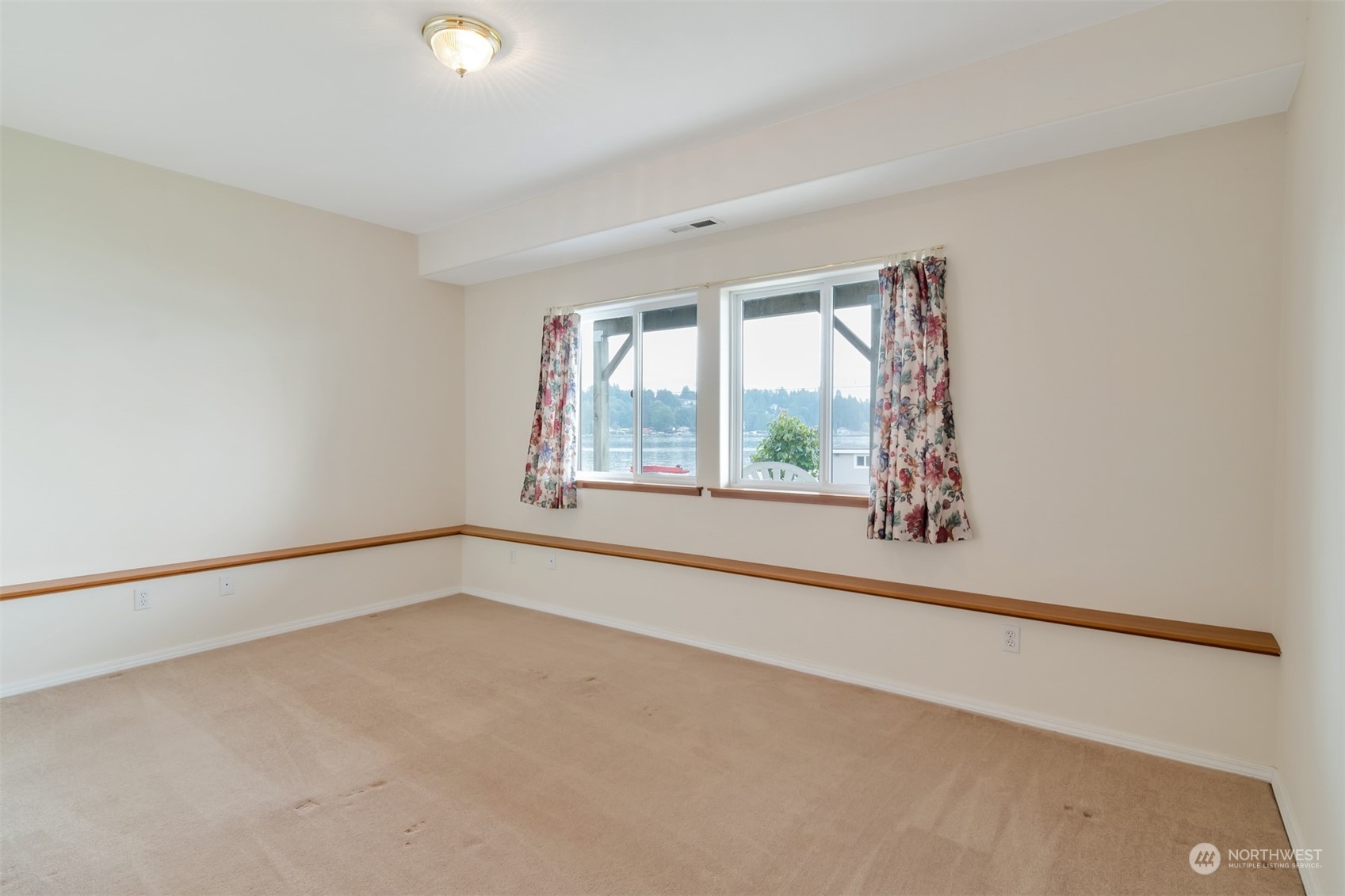 1811 Vernon Road Lake Stevens, WA 98258 - Photo 23 of 40 a view of an empty room with a window