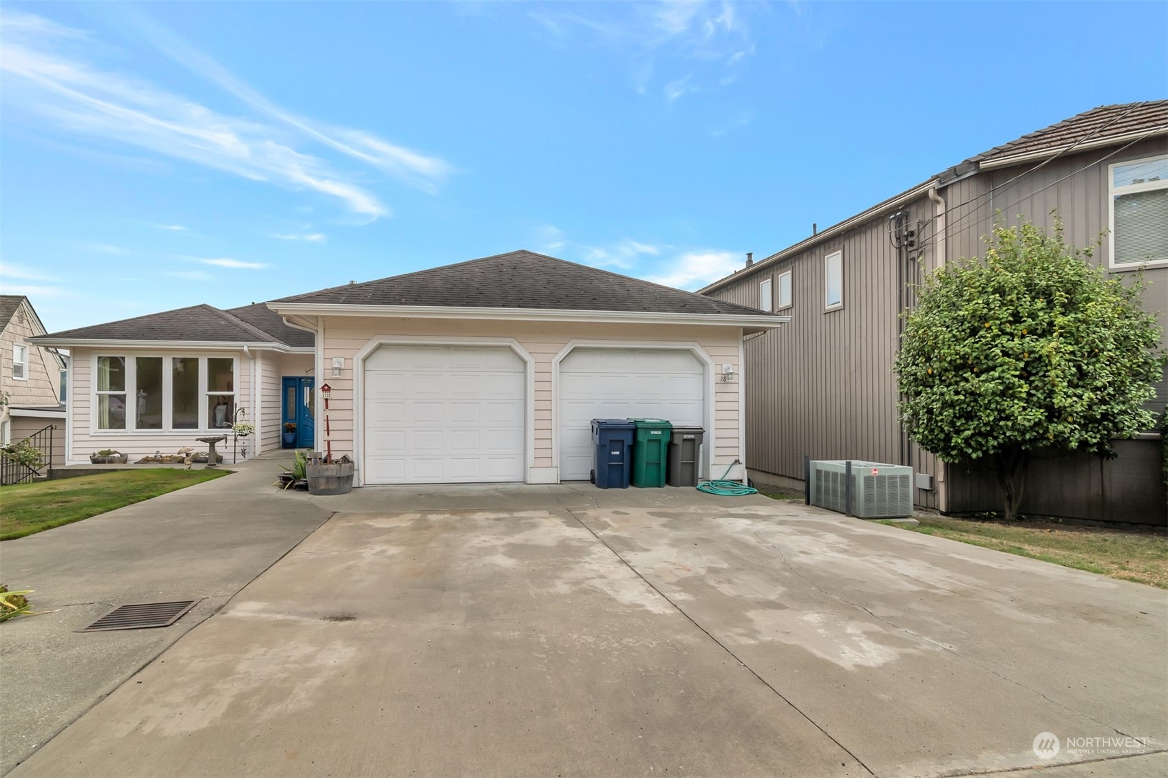 1811 Vernon Road Lake Stevens, WA 98258 - Photo 35 of 40 a front view of a house with a yard and garage