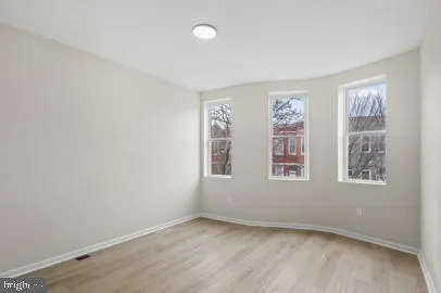 an empty room with windows
