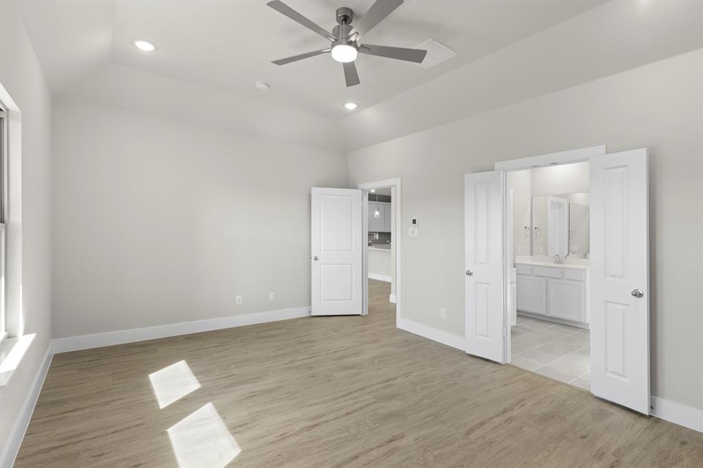 2359 Bell Way Forney, TX 75126 - Photo 25 of 31 wooden floor in an empty room with a window