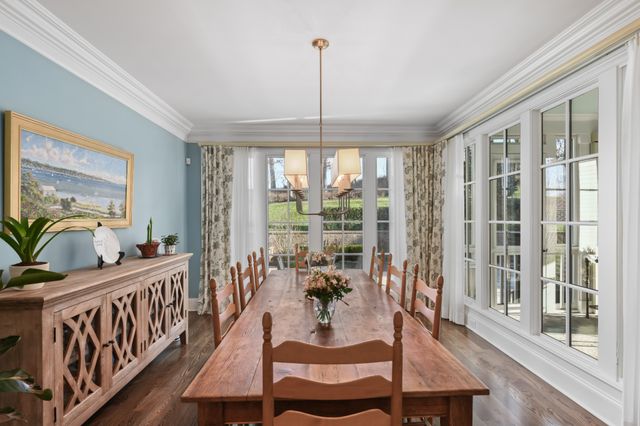 a bedroom with a bed and a table in it