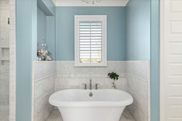 a kitchen with sink cabinets and window