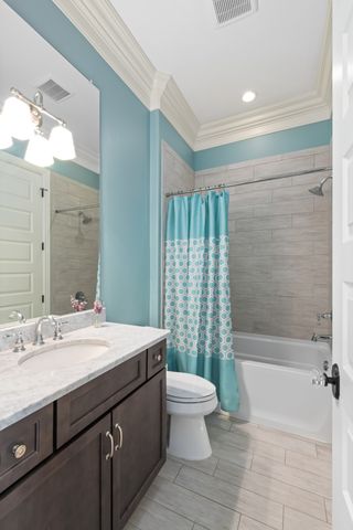 a view of a balcony with furniture