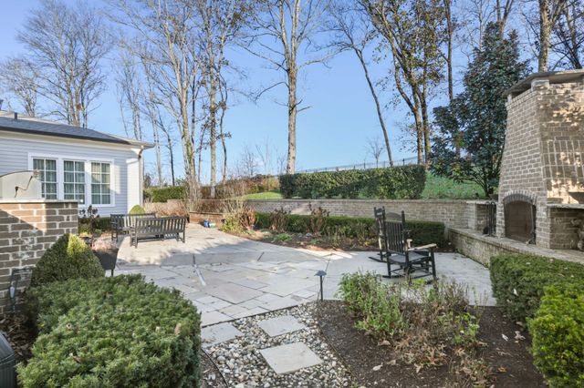 a view of a chairs and table in the terrace