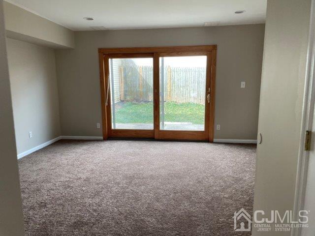 11 Florida Grove Road, Unit 5 Keasbey, NJ 08832 - Photo 2 of 12 a view of an empty room with a window