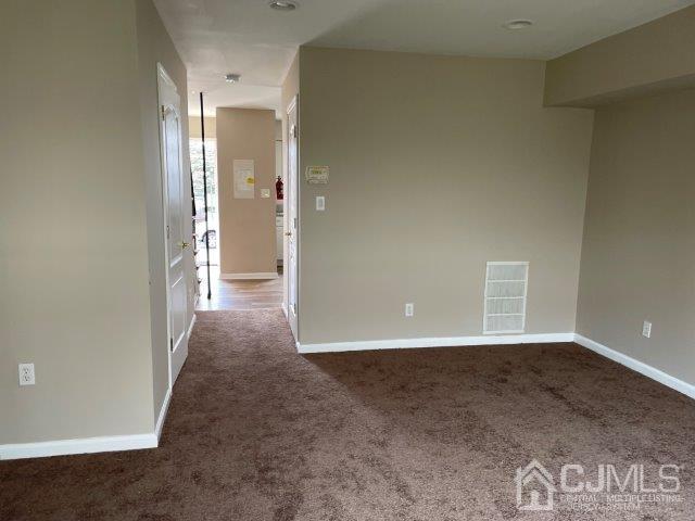 11 Florida Grove Road, Unit 5 Keasbey, NJ 08832 - Photo 3 of 12 an empty room with windows