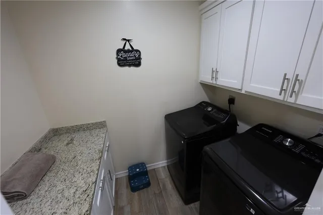 a view of workspace with cabinets