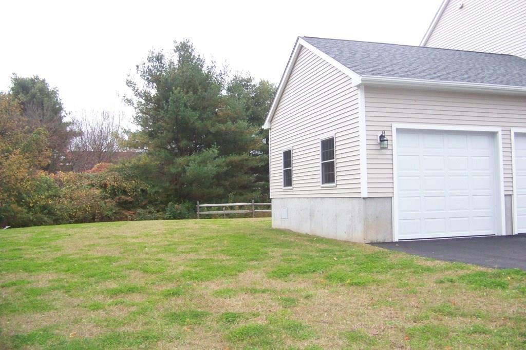509 Main Street, Unit 4 Old Saybrook, CT 06475 - Photo 18 of 27 a view of a backyard with hardwood