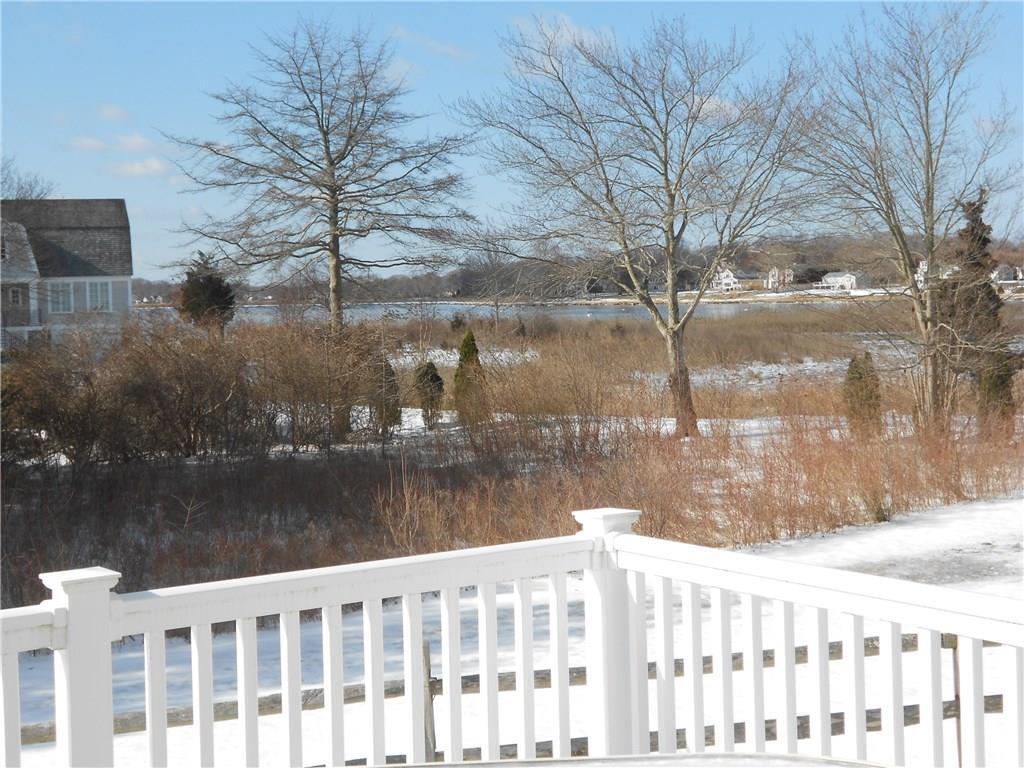 509 Main Street, Unit 4 Old Saybrook, CT 06475 - Photo 26 of 27 a view of a lake from a yard