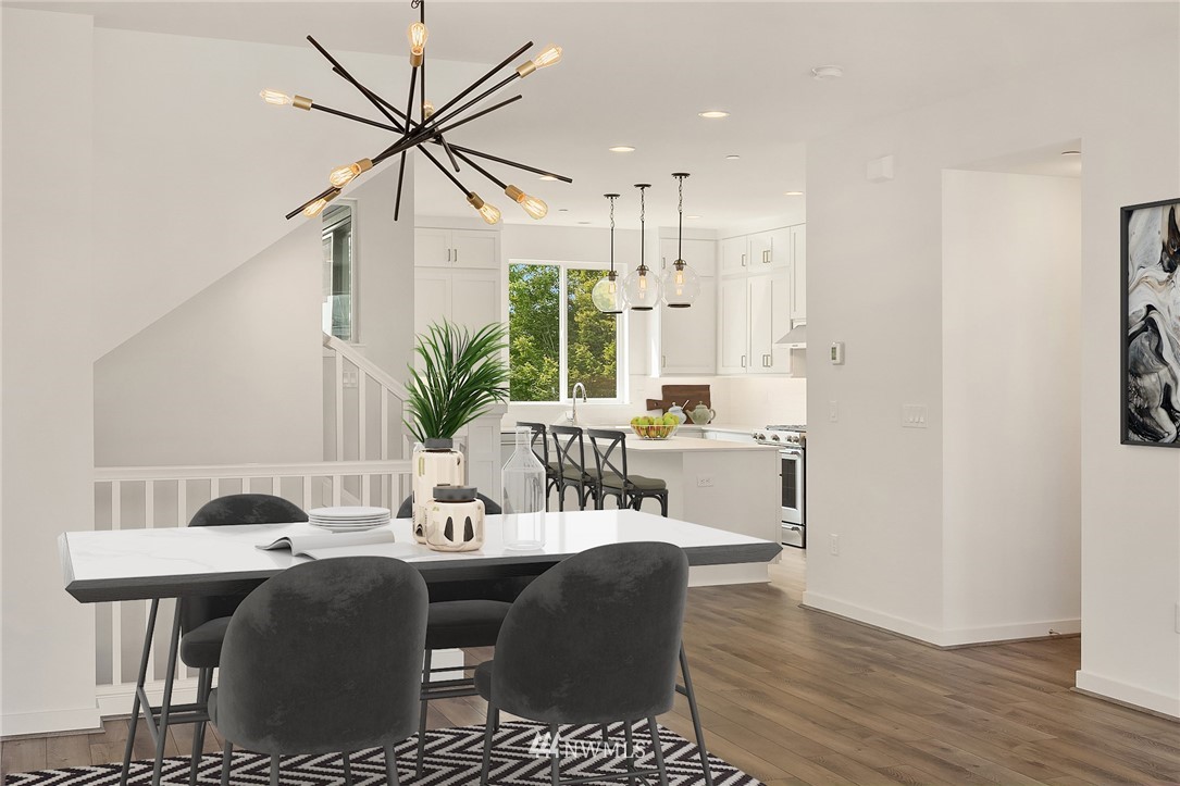 21711 25th (site 17) Street Southeast, Unit C Bothell, WA 98021 - Photo 4 of 10 a view of a dining room with furniture window and wooden floor