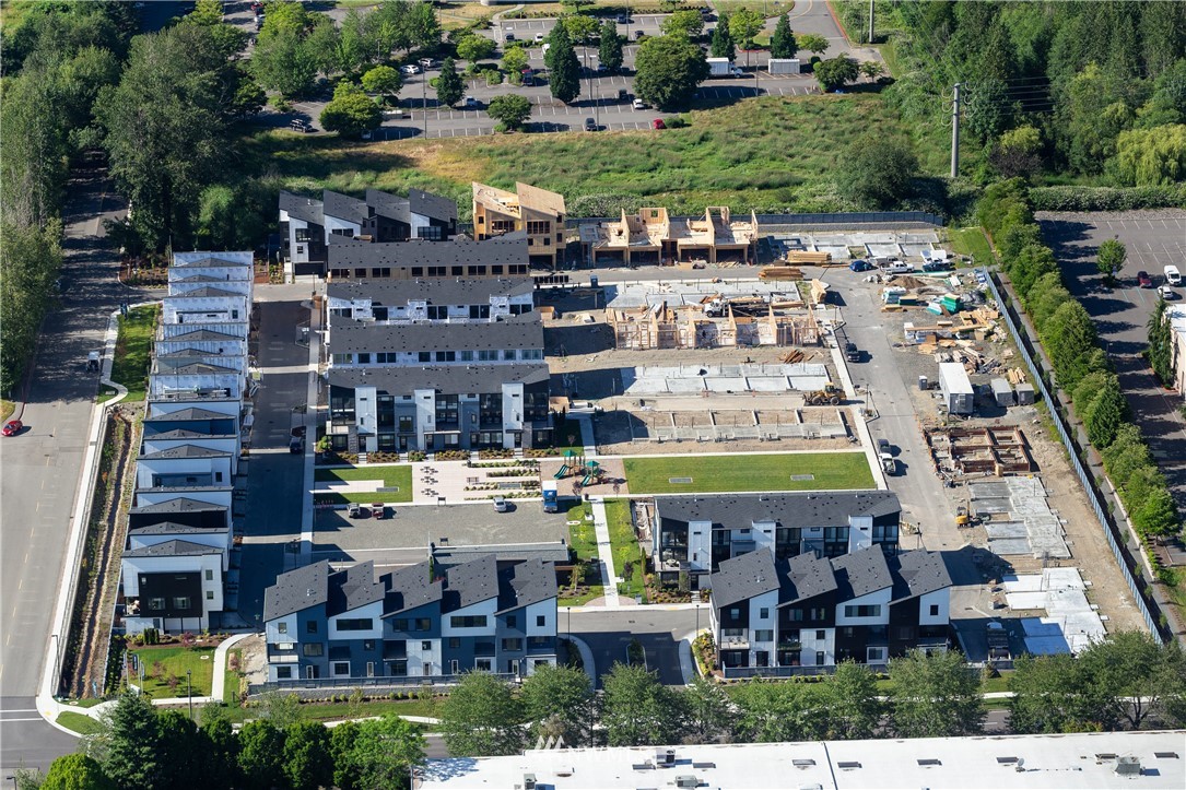 21711 25th (site 17) Street Southeast, Unit C Bothell, WA 98021 - Photo 9 of 10 a view of swimming pool with outdoor seating yard and outdoor seating