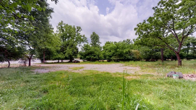 a view of backyard with green space