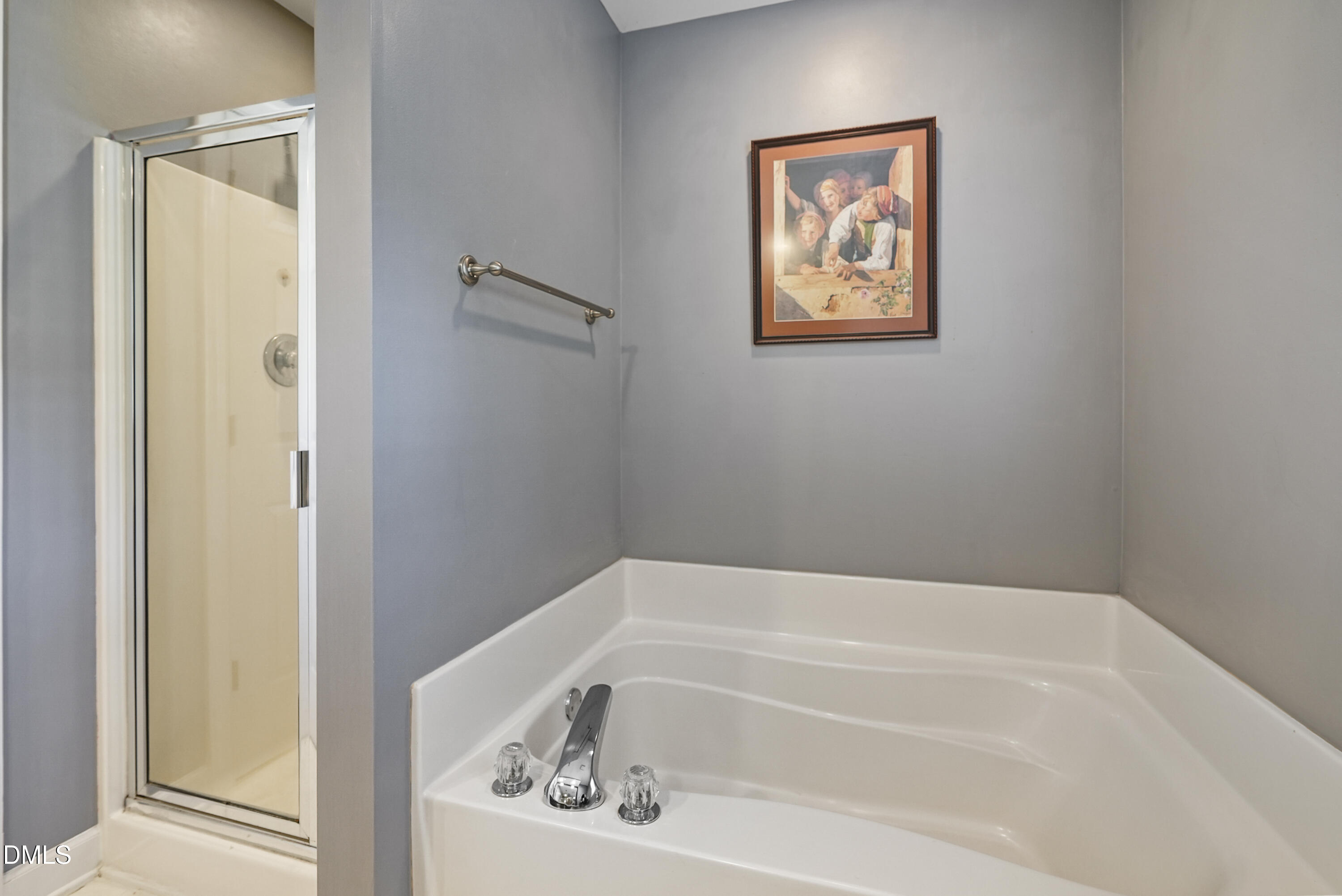 4912 Morning Edge Drive Raleigh, NC 27613 - Photo 27 of 35 a bathroom with a tub