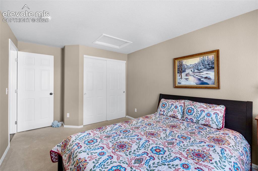7840 Midnight Road Peyton, CO 80831 - Photo 28 of 48 2nd bedroom - notice the good sized closet and natural light