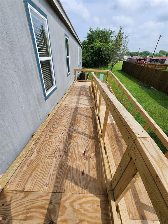 191 Sioux Quitman, TX 75783 - Photo 4 of 23 a view of swimming pool with a garden and trees
