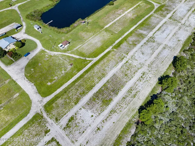 a view of a garden with a lake