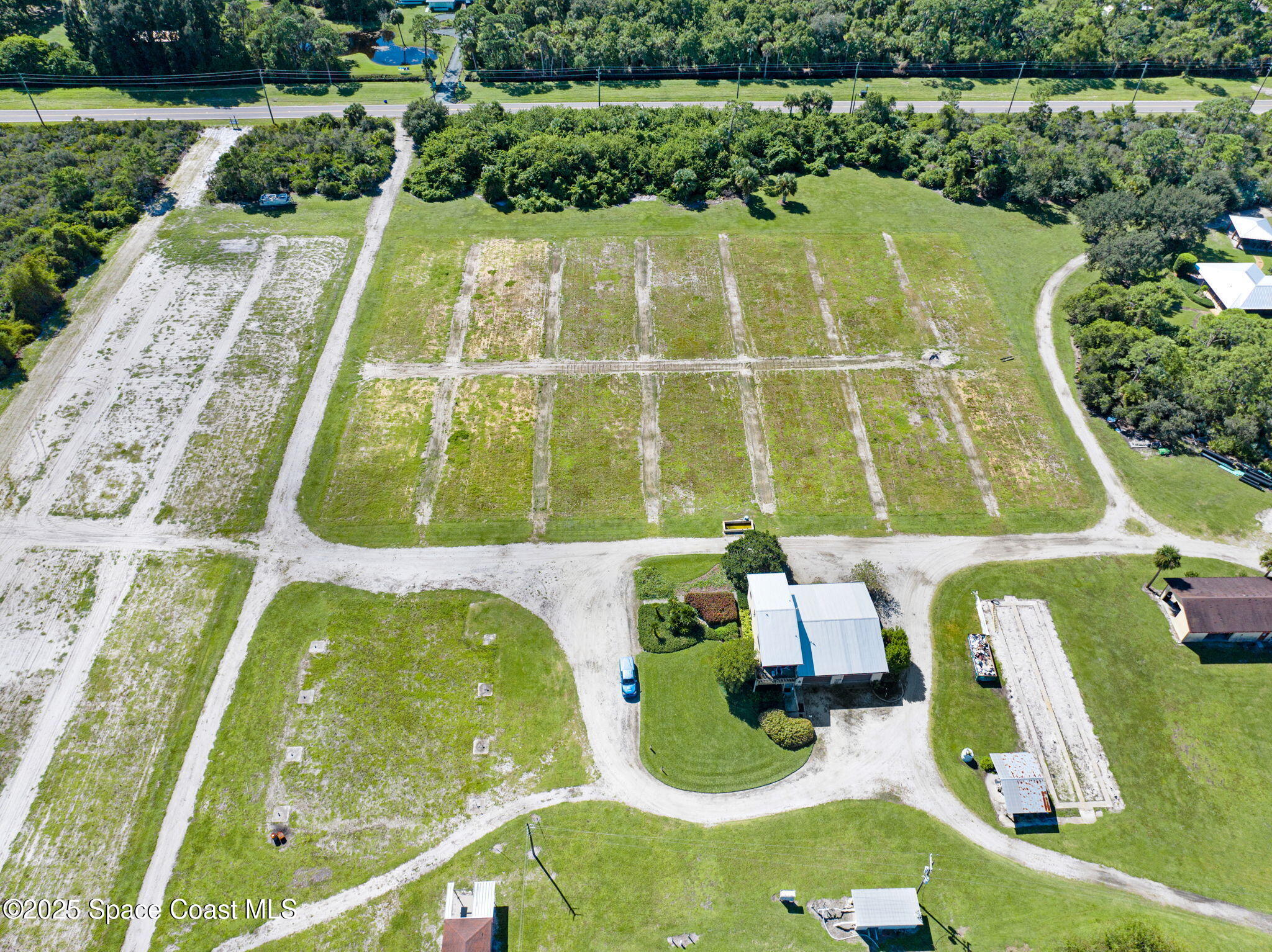 B Berry Road Grant Valkaria, FL 32949 - Photo 7 of 46 an aerial view of a swimming pool