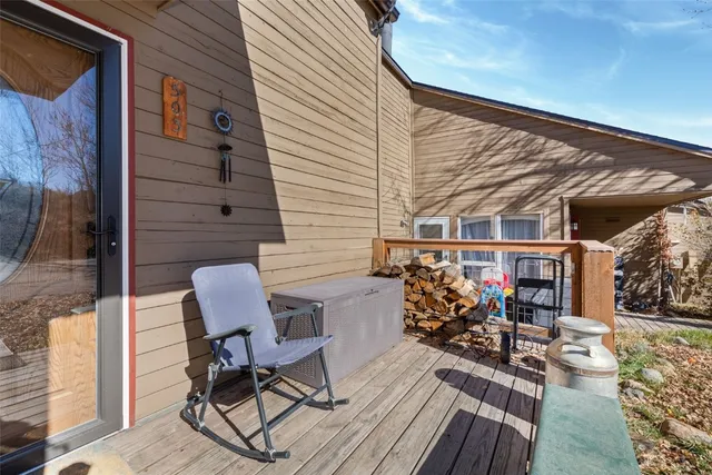 a view of a chairs on the deck