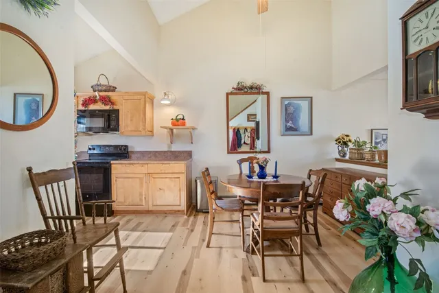 a dining room with furniture and window