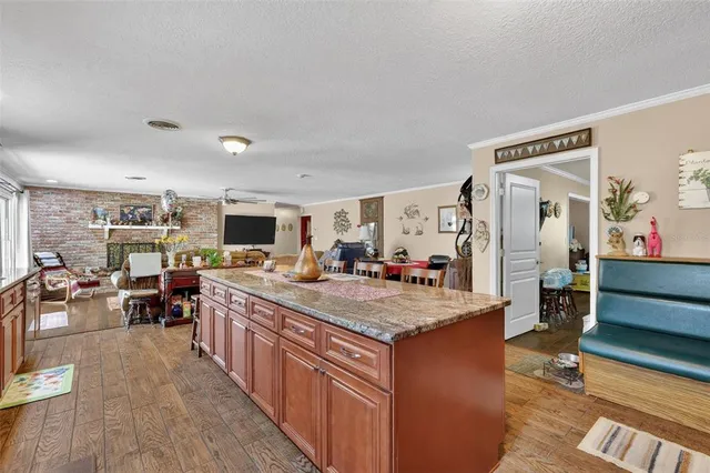 a view of a dining room with furniture and toys