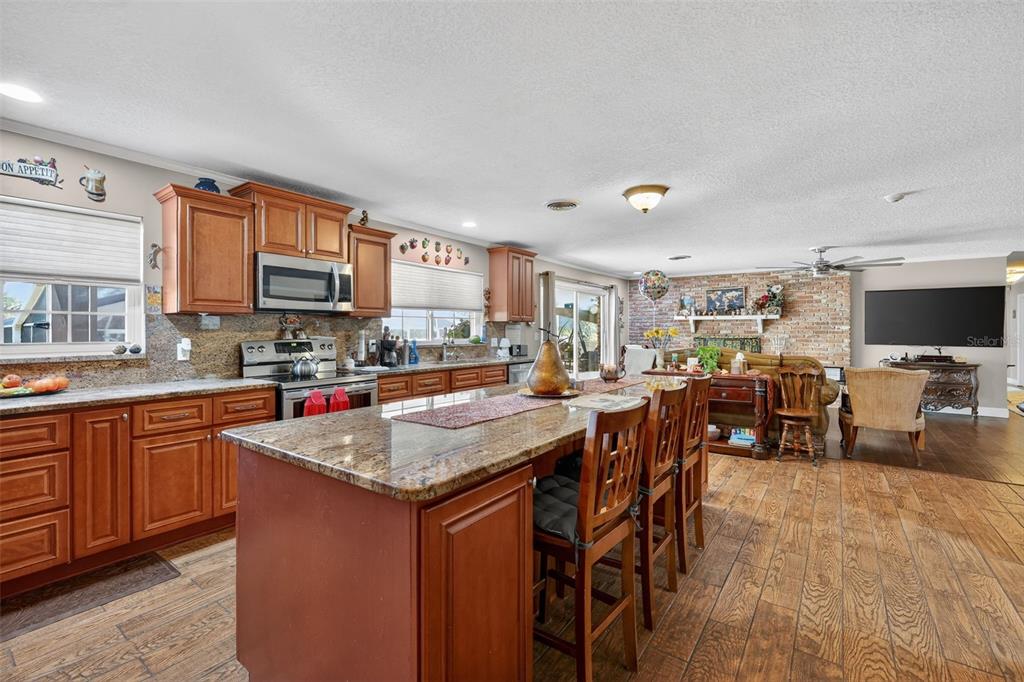 2230 Southwest 87th Place Ocala, FL 34476 - Photo 21 of 42 a kitchen with lots of counter top space