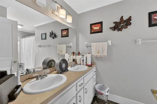 a view of a patio with table and chairs with wooden floor