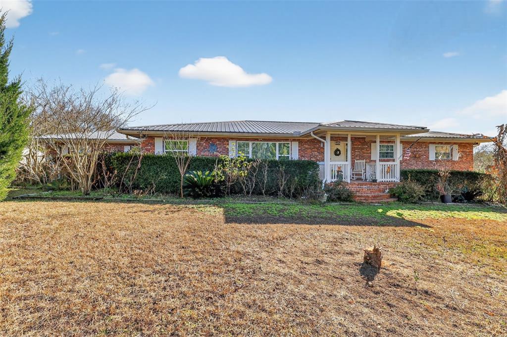 2230 Southwest 87th Place Ocala, FL 34476 - Photo 8 of 42 a view of a house with a yard