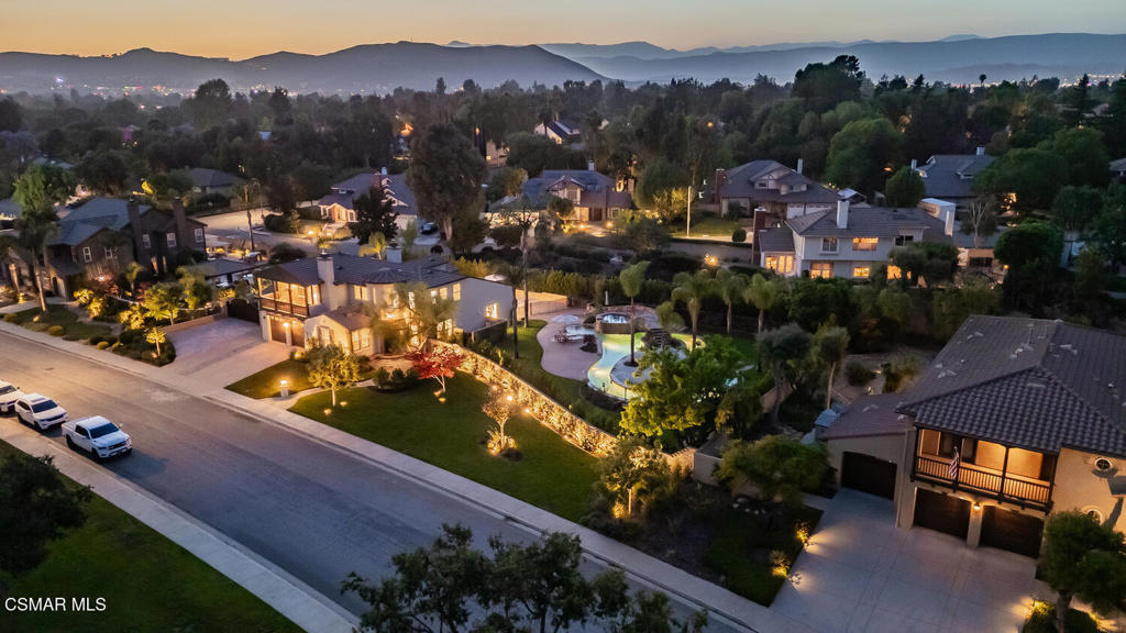 an aerial view of residential houses and outdoor space