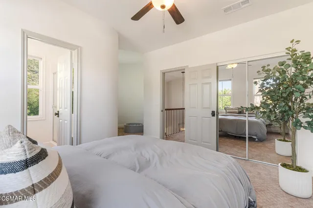 a view of a backyard with sitting area and furniture