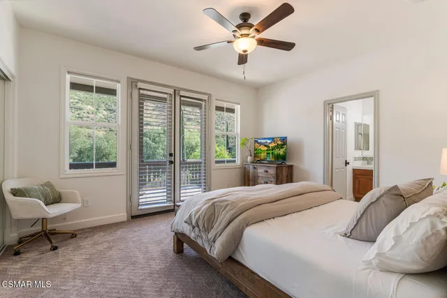 a front view of house with yard and outdoor seating