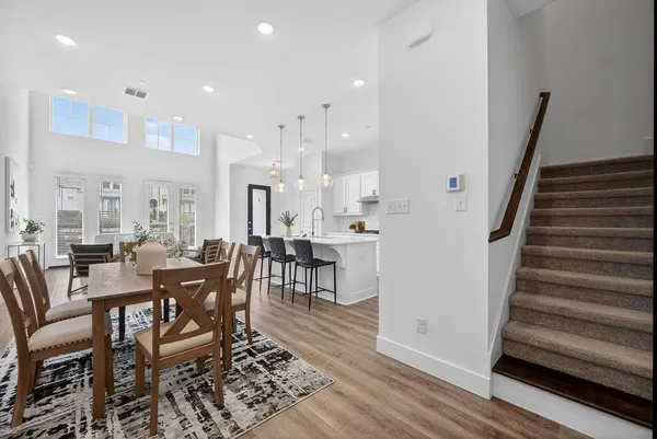 a view of a dining room with furniture