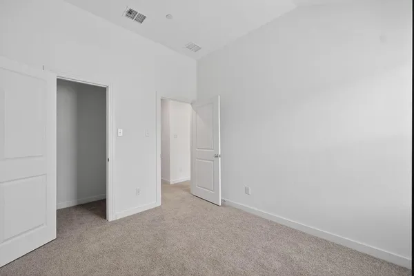 an empty room with closet