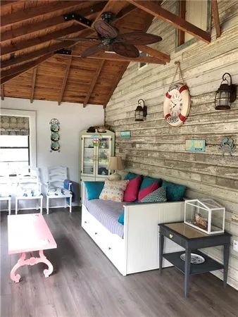 a living room with a couch and a table