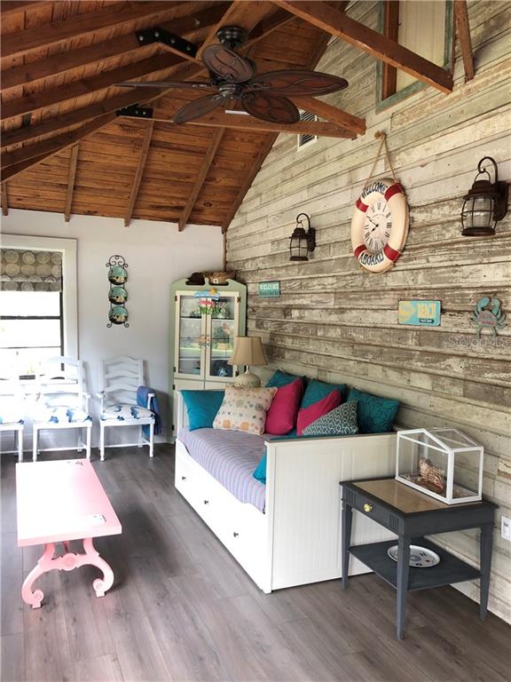 Undisclosed Address Bradenton, FL 34208 - Photo 2 of 13 a living room with a couch and a table