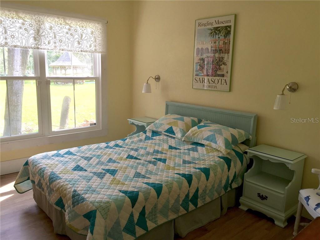 Undisclosed Address Bradenton, FL 34208 - Photo 9 of 13 a bedroom with a bed and a window