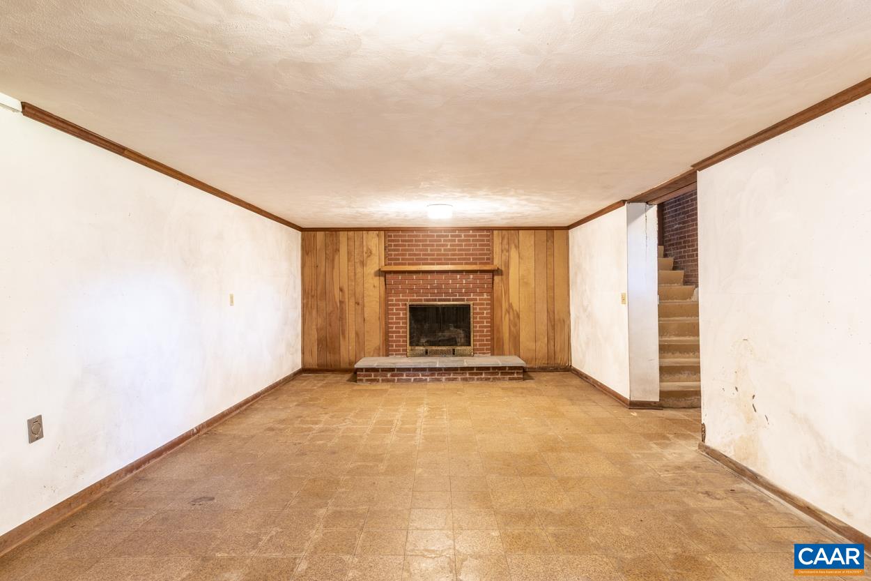 Gibbs Road Madison, VA 22727 - Photo 57 of 66 a view of an empty room with a fireplace