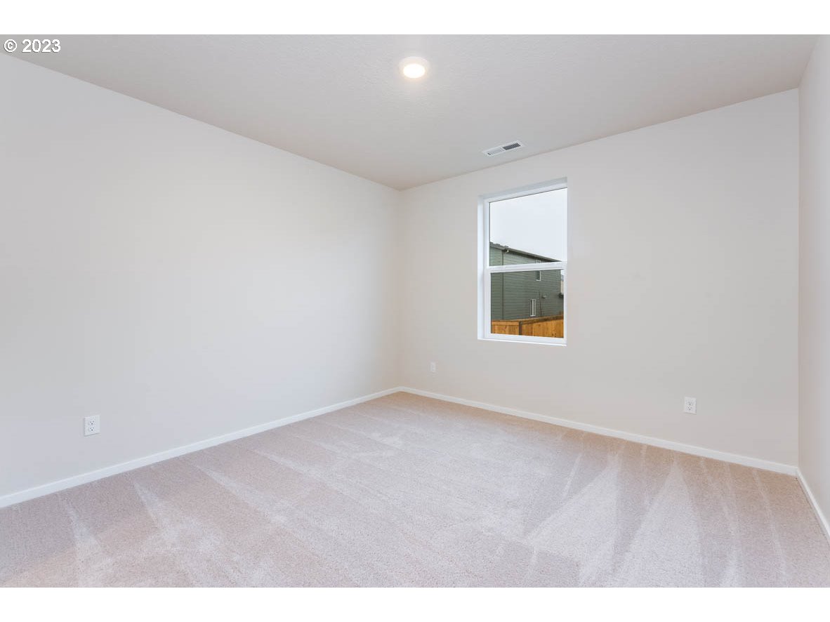 3217 Southeast 35th Street Gresham, OR 97080 - Photo 19 of 30 a view of an empty room with a window