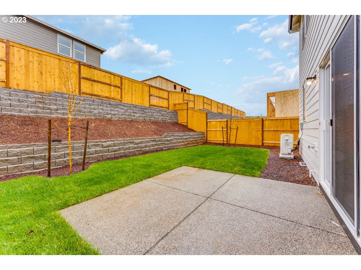 3217 Southeast 35th Street Gresham, OR 97080 - Photo 30 of 30 a view of a back yard with an empty space