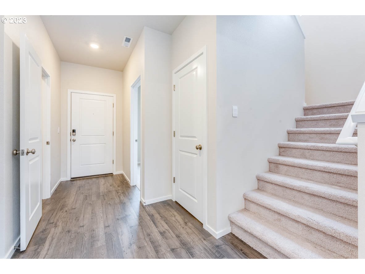 3217 Southeast 35th Street Gresham, OR 97080 - Photo 4 of 30 a view of an entryway with wooden floor
