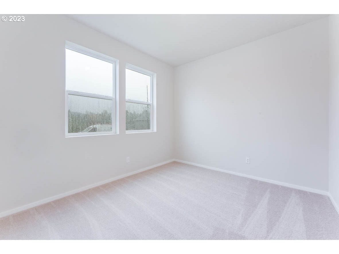 3217 Southeast 35th Street Gresham, OR 97080 - Photo 6 of 30 an empty room with a window
