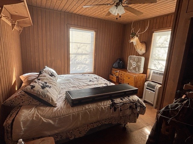 11943 Cr 310 Rocksprings Tx 78880 Rocksprings, TX 78880 - Photo 11 of 61 a bed sitting in a bedroom next to a window