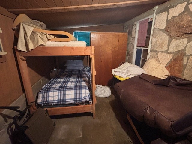 11943 Cr 310 Rocksprings Tx 78880 Rocksprings, TX 78880 - Photo 13 of 61 a bedroom with a bed and a window