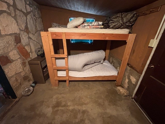 11943 Cr 310 Rocksprings Tx 78880 Rocksprings, TX 78880 - Photo 14 of 61 a bed sitting in a room