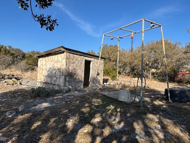 11943 Cr 310 Rocksprings Tx 78880 Rocksprings, TX 78880 - Photo 32 of 61 a view of a house with a yard