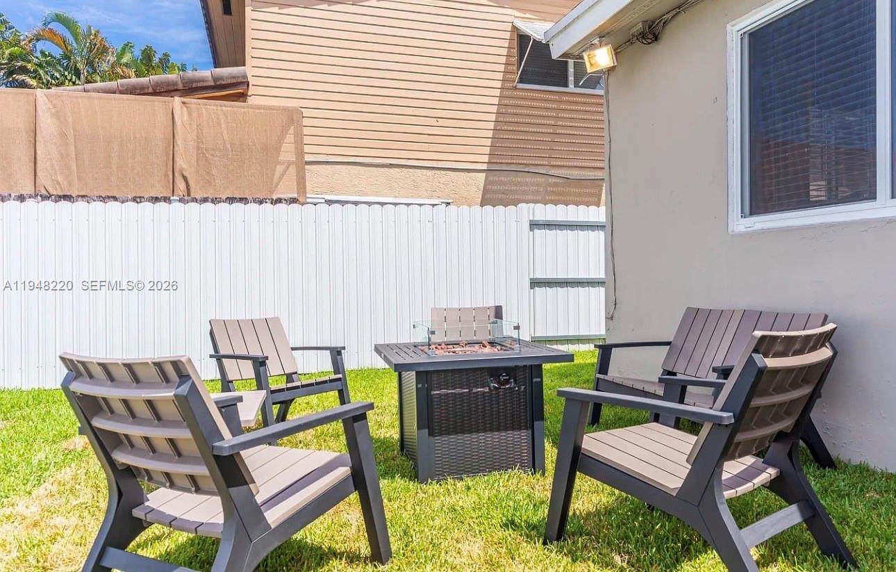 211 Southeast 3rd Street Dania Beach, FL 33004 - Photo 17 of 20 a view of a outdoor seating area