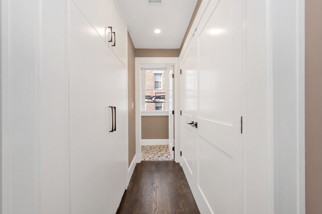 91 Parkton Road, Unit 1 Boston, MA 02130 - Photo 24 of 35 a view of a hallway