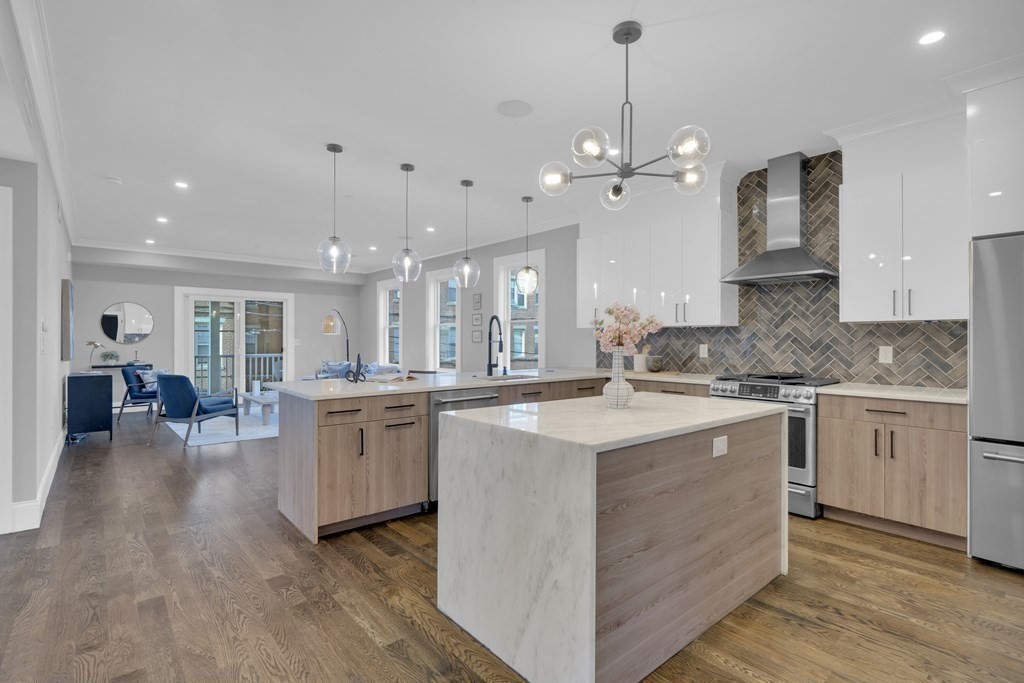 91 Parkton Road, Unit 1 Boston, MA 02130 - Photo 8 of 35 a large kitchen with granite countertop lots of counter top space