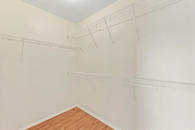 a view of a room with racks on the wall